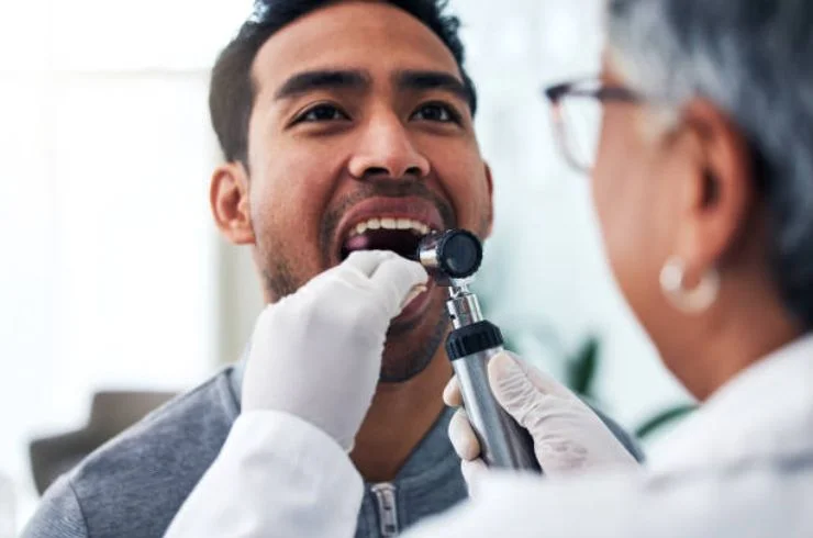 Regular screenings for early detection of oral cancer